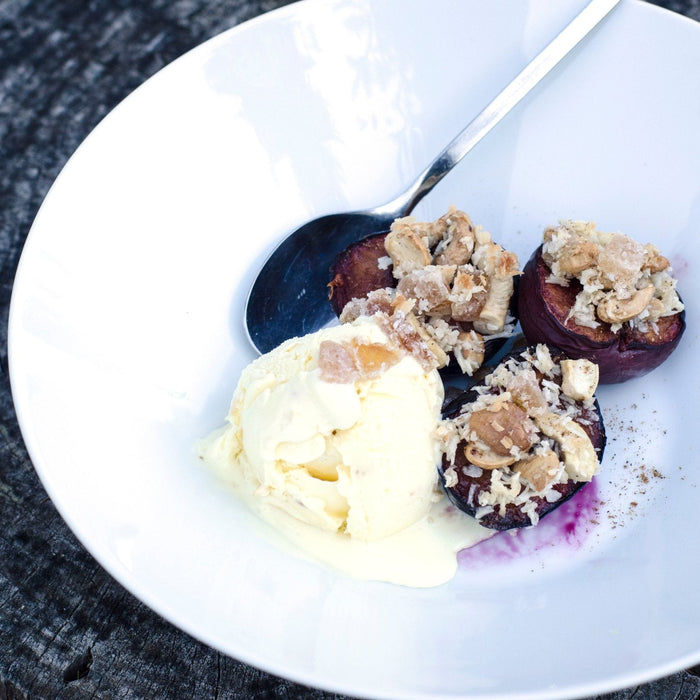 Five Spice Mini Plum Crumbles with ice cream in a bowl - organicfair.com